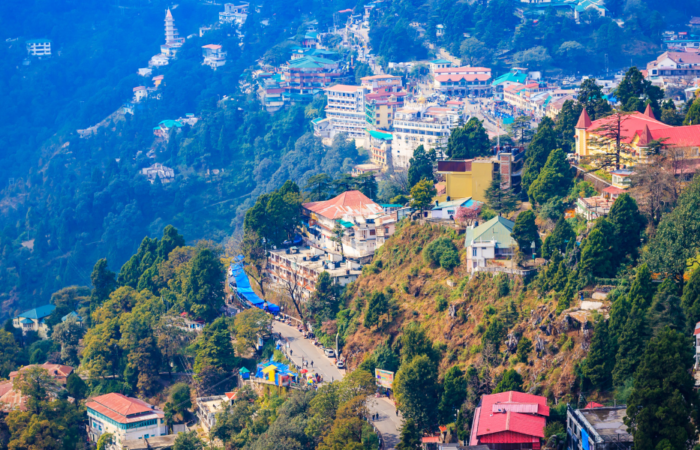 A landscape shot showing houses sat on the side of a steep hill