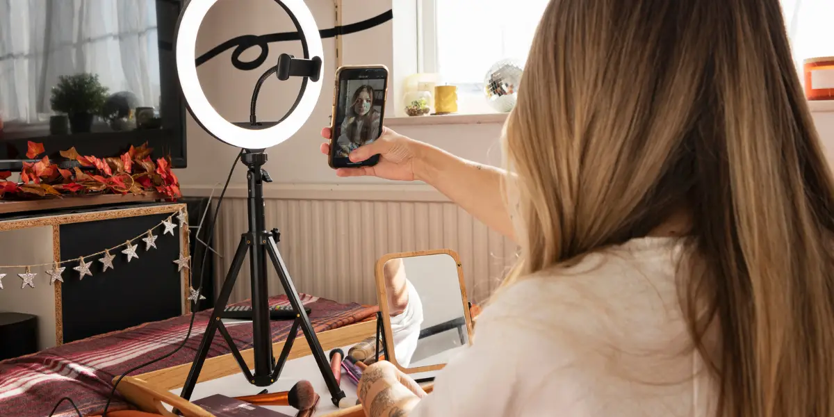 A woman using a ring light